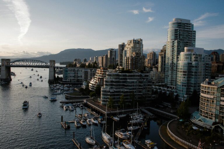 Vancouver skyline with marina, bridge, and mountains